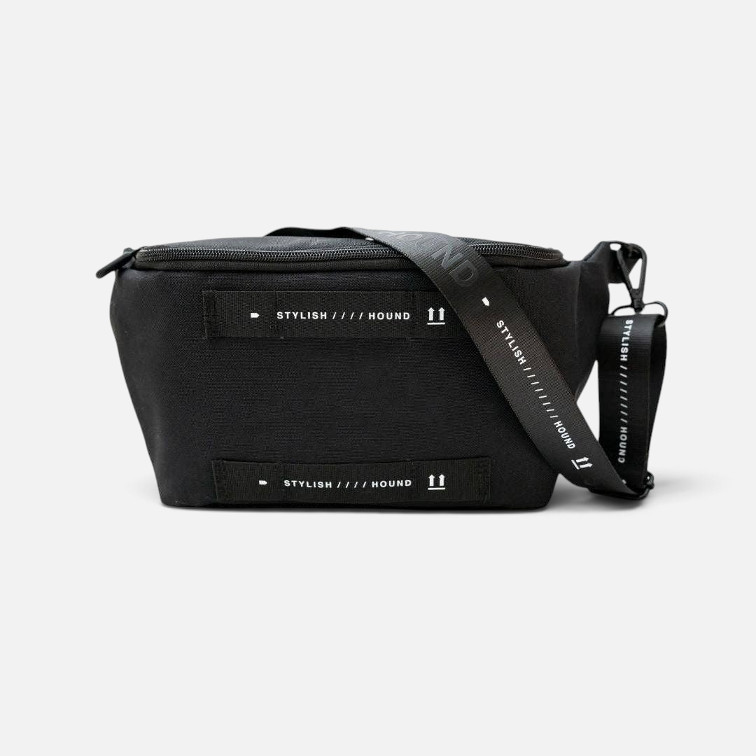 The Dog Emporium black canvas waist and cross body bag with adjustable logo strap and external poop bag dispenser.