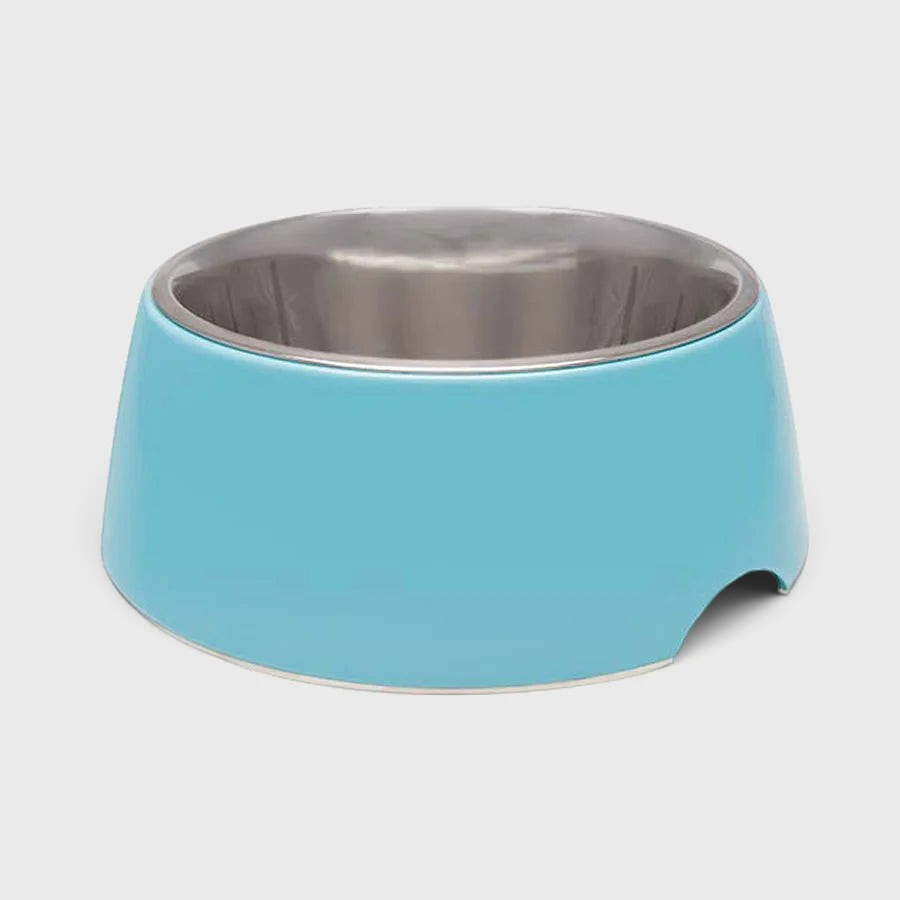 The Dog Emporium retro pet bowl in light blue with a stainless steel insert and a convenient side handle cut-out.