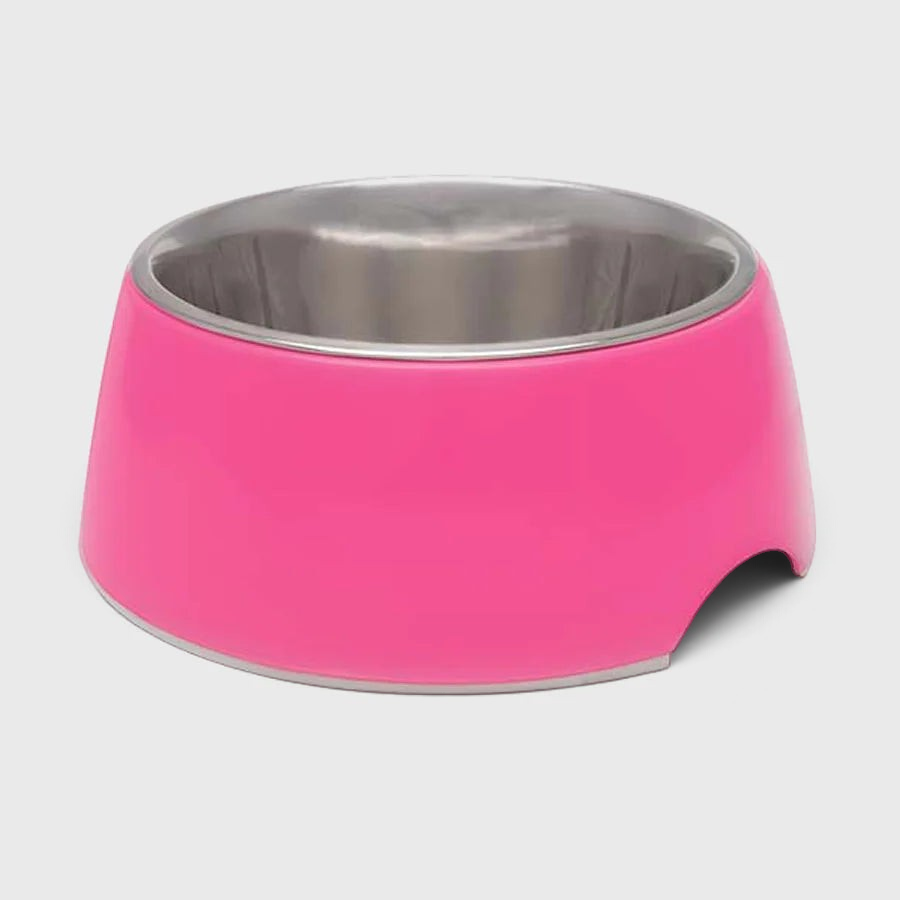 The Dog Emporium pink retro pet bowl with a stainless steel insert and a convenient side cut-out for easy lifting.