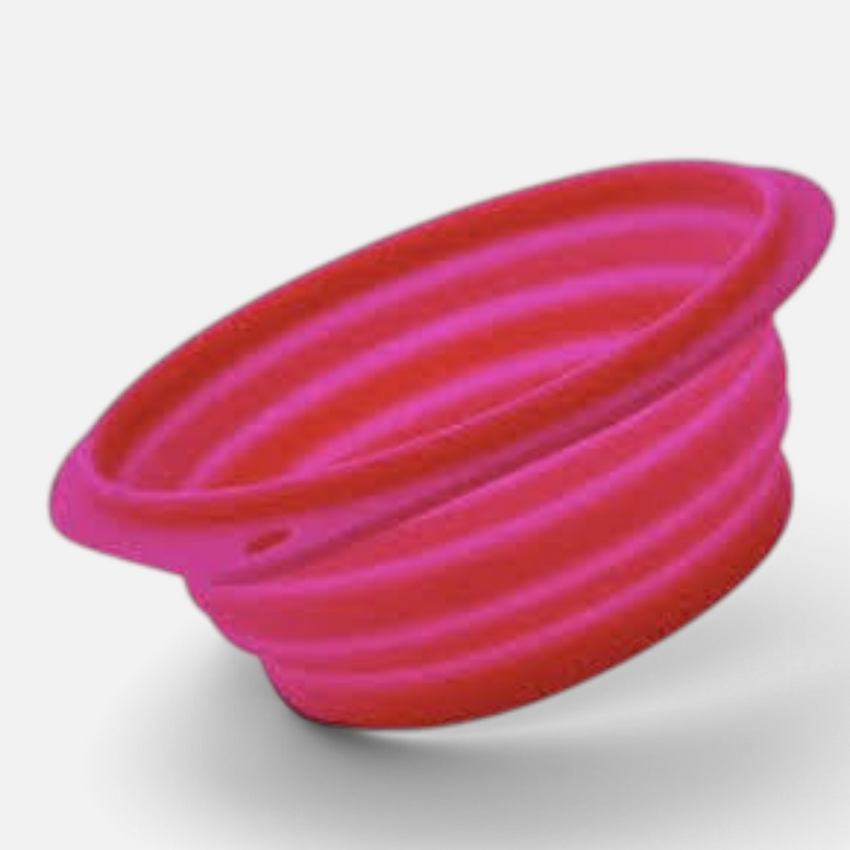 The Dog Emporium pink silicone collapsible bowl for travel and feeding
