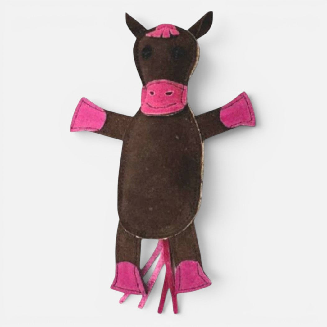 Felt horse toy with pink mane and legs on a white background