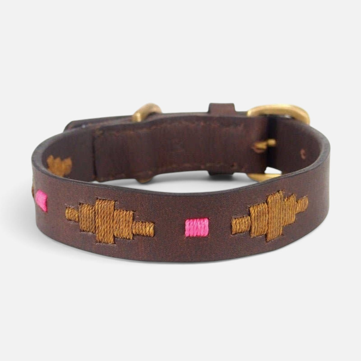The Dog Emporium Mage polo dog collar in brown buffalo leather with pink and brown waxed thread stitching and brass