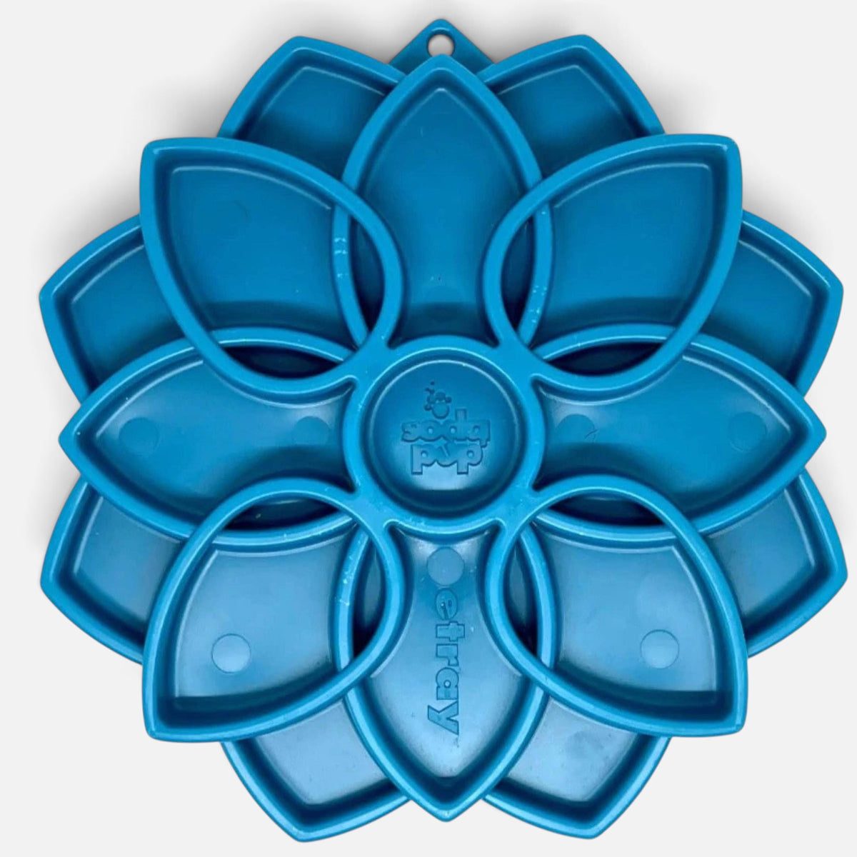 The Dog Emporium blue Mandala eTray slow feeder for dogs with a flower-shaped design to promote healthy digestion.